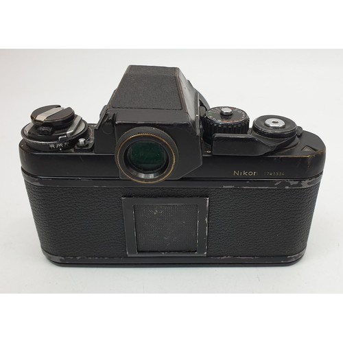 363 - A Nikon F3 camera with a Nikon 24mm lens. UK shipping £14.