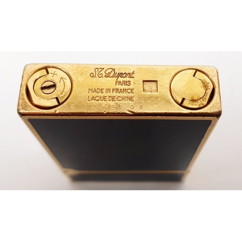 364 - An St. Dupont Chinese lacquer cigarette lighter. UK shipping £14.