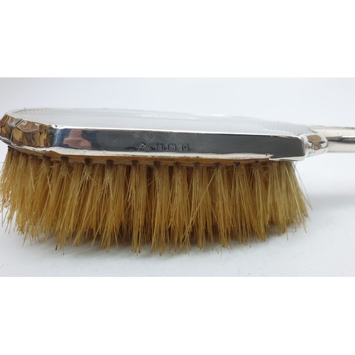 368 - A silver backed dressing table brush, Birmingham 1938. UK shipping £14.