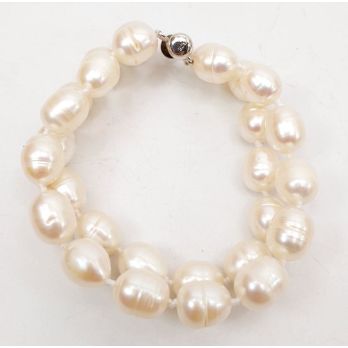 382 - A boxed Thomas Sabo silver and pearl bracelet. UK shipping £14.