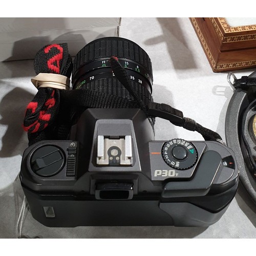 163 - A Pentax P30 camera with a Pentax 28-80mm lens. UK shipping £14.