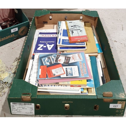 227 - A box of yachting ephemera including admiralty charts. UK shipping £14.