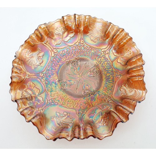 275 - A carnival glass Dragon and Lotus dish, diameter 8