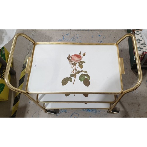 317 - A three heights tea trolley, width 28