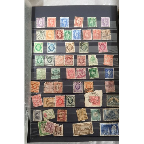 330 - A stamp album including a Penny Red and other Victorian stamps. UK shipping £14.