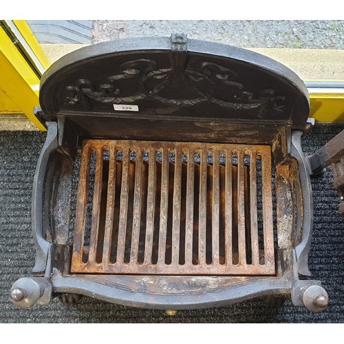 339 - A cast iron dog grate, width 18.5