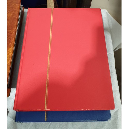 400 - Two stamp albums, one including three Penny Reds. UK shipping £14.