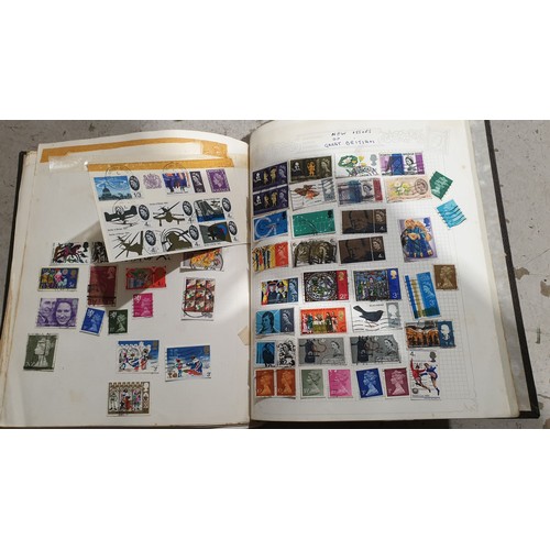 401 - A stamp album and loose stamps. UK shipping £14.