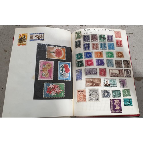 402 - A folder of Guernsey stamps and a stamp album and other stamp books. UK shipping £14.