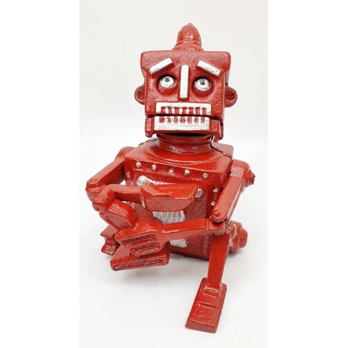 440 - A cast iron Robert the Robot moneybox, height 6.75