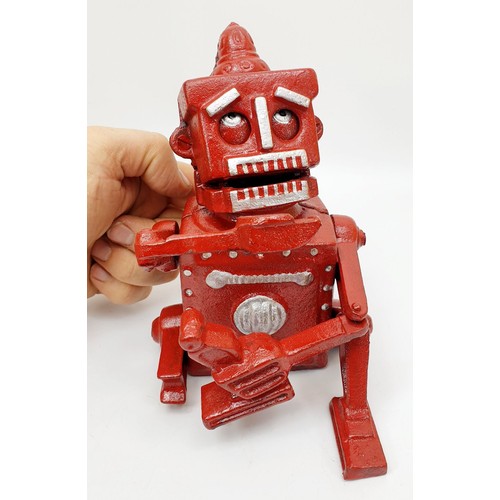 440 - A cast iron Robert the Robot moneybox, height 6.75