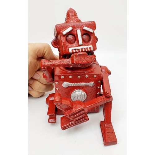 440 - A cast iron Robert the Robot moneybox, height 6.75