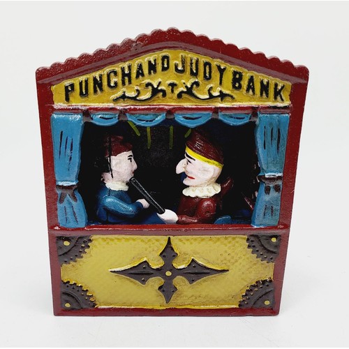 282 - A cast iron Punch and Judy money box, height 7