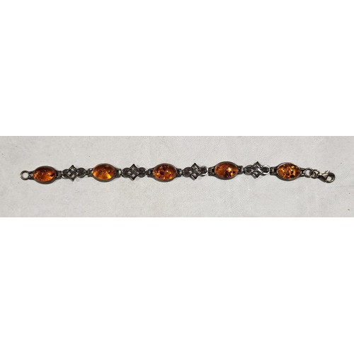 423 - A silver and amber bracelet together with costume jewellery together with a jewellery box. UK shippi... 