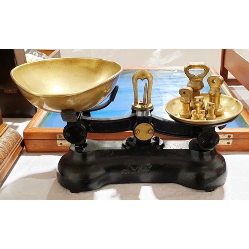 3 - An antique set of cast iron and brass scales with weights. UK shipping £14.