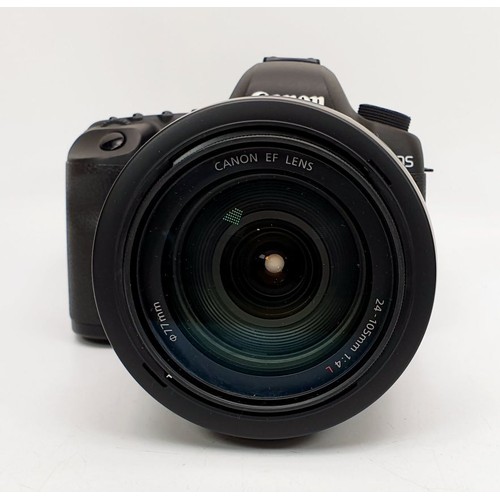 45 - A Canon EOS 5D Mark II camera together with a 24-105mm lens and accessories. UK shipping £14.