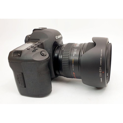 45 - A Canon EOS 5D Mark II camera together with a 24-105mm lens and accessories. UK shipping £14.