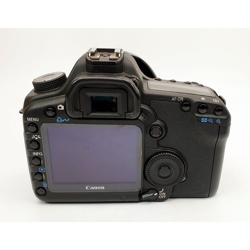 45 - A Canon EOS 5D Mark II camera together with a 24-105mm lens and accessories. UK shipping £14.