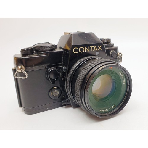 47 - A Contax 139 quartz camera with a Carl Zeiss Planar T 50mm f/1.7 lens together with an Hanimex flash... 