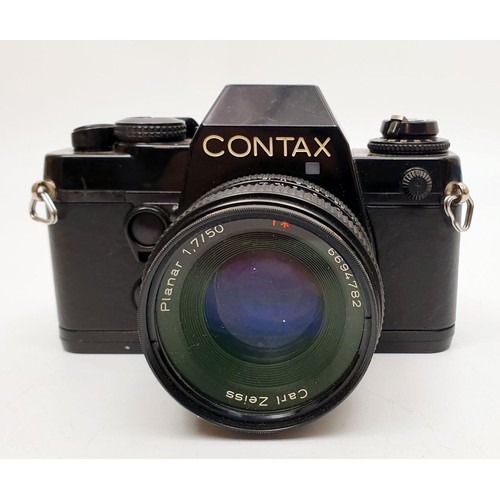 47 - A Contax 139 quartz camera with a Carl Zeiss Planar T 50mm f/1.7 lens together with an Hanimex flash... 