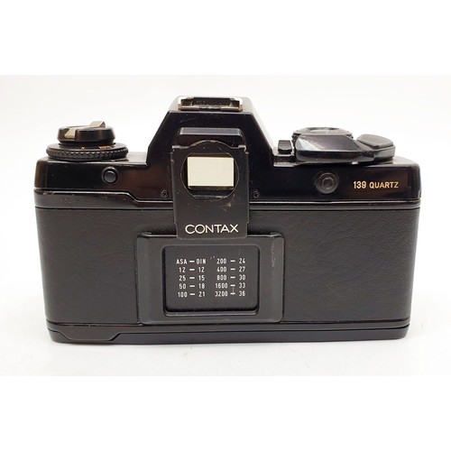 47 - A Contax 139 quartz camera with a Carl Zeiss Planar T 50mm f/1.7 lens together with an Hanimex flash... 