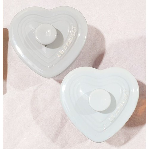 68 - Two ceramic Le Creuset heart shaped lidded canisters, length 4.5