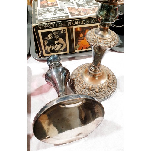 71 - A pair of silver plated candlesticks, height 9.5