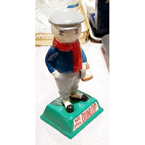 61 - A cast iron Dunlop golf figure, height 5.5