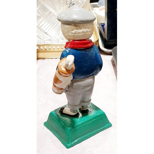 61 - A cast iron Dunlop golf figure, height 5.5