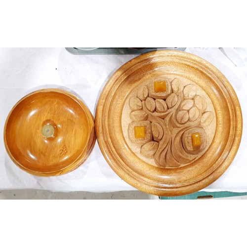 100 - A carved teak wall decoration, diameter 14.75