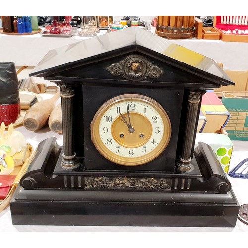 469 - A Victorian slate mantel clock. width 18