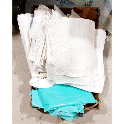 152 - A box of linens and postage bags. UK shipping £14.