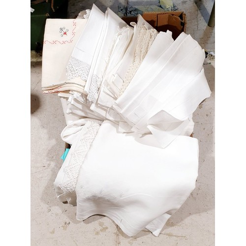 152 - A box of linens and postage bags. UK shipping £14.