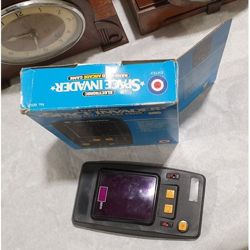 166 - A vintage Emtex Space Invader hand held game A/F. UK shipping £14.