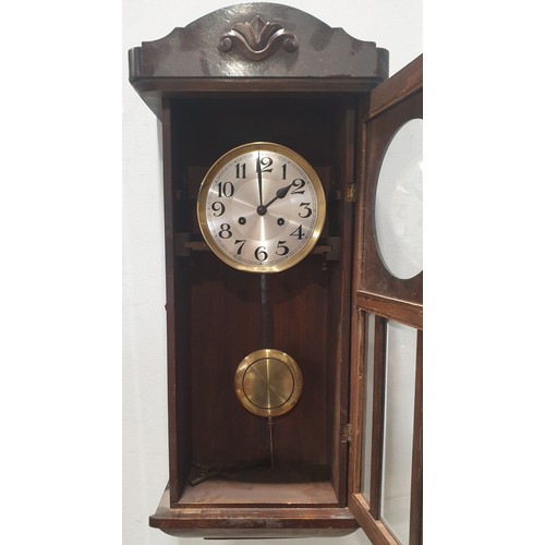 273 - An early 20th century oak wall clock, length 32