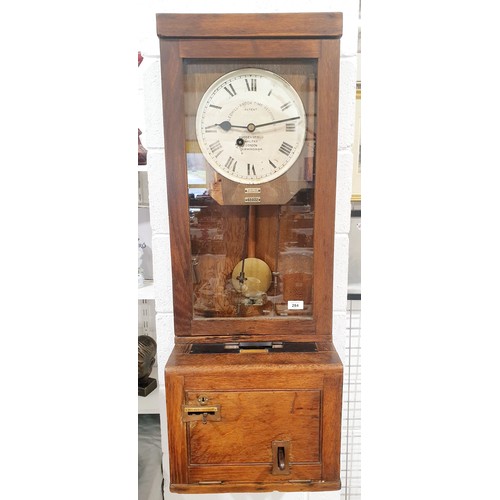 284 - A vintage Gledhill-Brook time recorder, clocking in machine in an oak case A/F, length 45