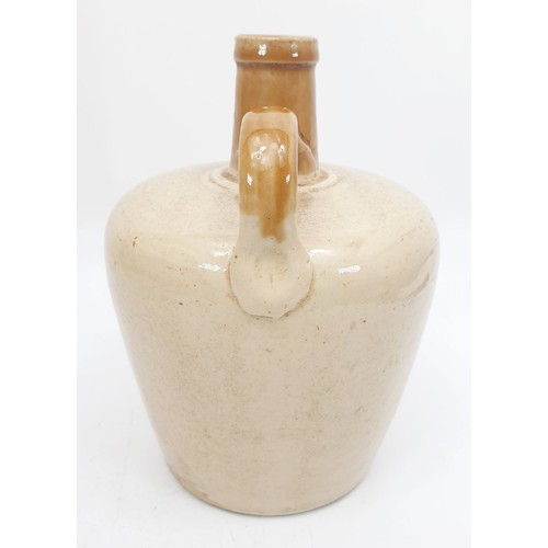 302 - An antique stoneware Glengelt whiskey bottle, height 7.25