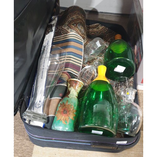 350 - A suitcase including glassware and carpet samples. No shipping. Arrange collection or your own packe... 