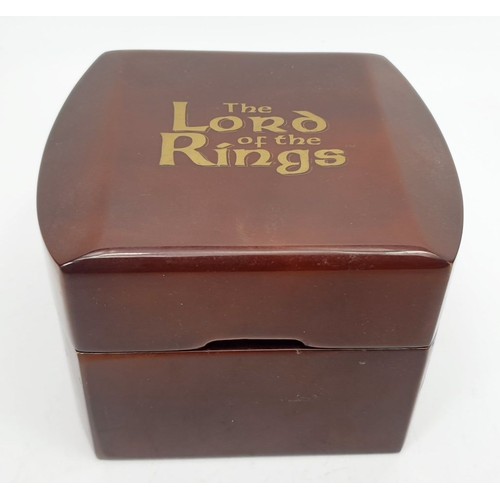 393 - A boxed Danbury Mint Lord of the Rings quartz wrist watch, working order. UK shipping £14.