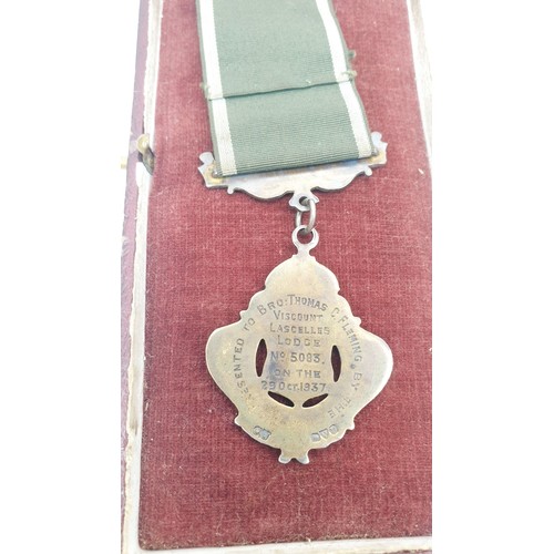 408 - A hallmarked silver masonic hospital medal, London 1951 together with a masonic jewel, The Grand Lod... 