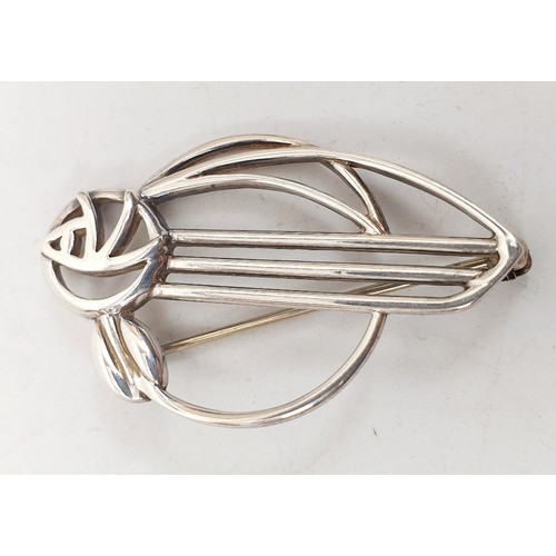 414 - A silver hallmarked Mackintosh style brooch, maker Carnick Jewellery Edinburgh 1994 together with on... 