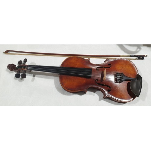 485 - An antique Czechoslovakian copy of an Antonius Stradivarius violin having one piece back, back lengt... 