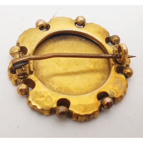 419 - An antique 9ct gold brooch, length 1