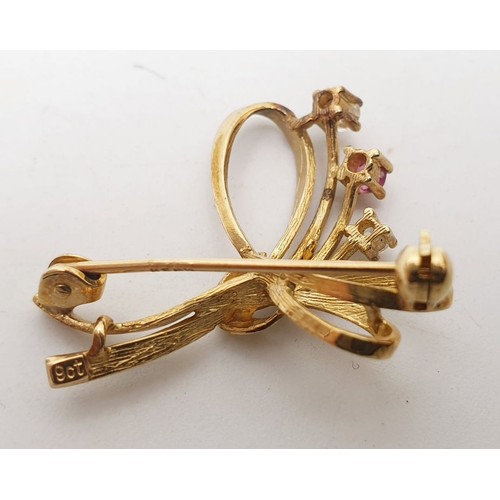 424 - A 9ct gold brooch set with white and pink stones, weight 2.2g. UK shipping £14.