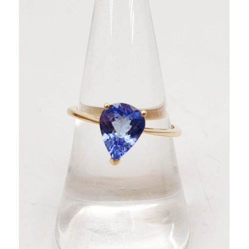 8 - A hallmarked 9ct gold ring set with AA Tanzanite, gross weight 1.7g, size O. UK shipping £14.