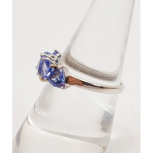 10 - A hallmarked 9ct gold ring set with AA+ Tanzanite, size N/O, gross weight 2.4g. UK shipping £14.