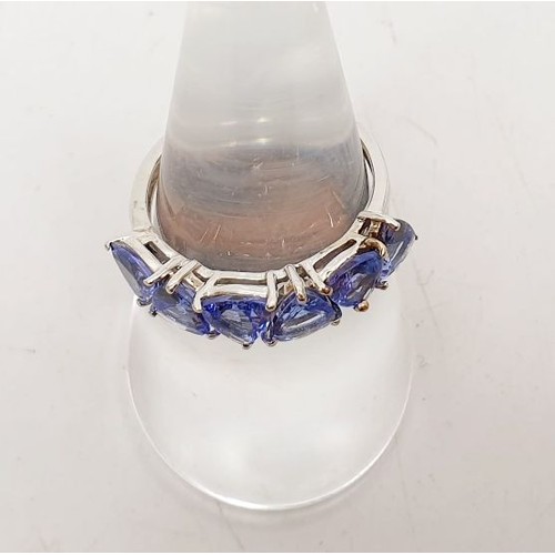 10 - A hallmarked 9ct gold ring set with AA+ Tanzanite, size N/O, gross weight 2.4g. UK shipping £14.