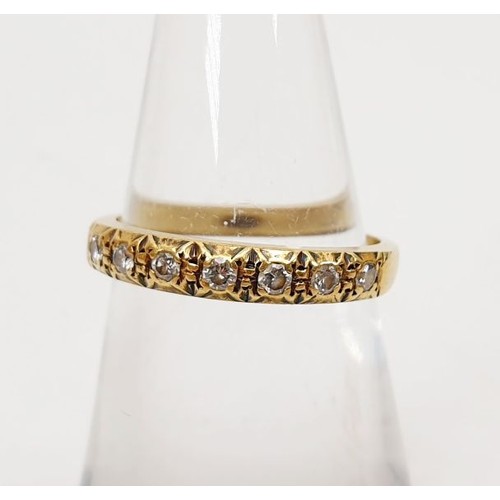 19 - An 18ct gold ring set with diamonds, size J, gross weight 2.2g. UK shipping £14.