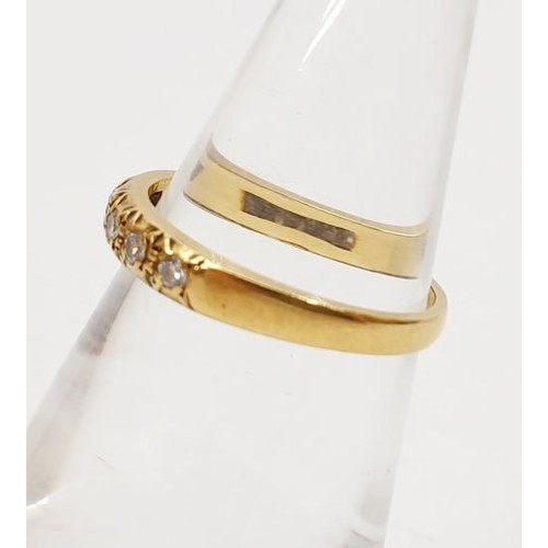 19 - An 18ct gold ring set with diamonds, size J, gross weight 2.2g. UK shipping £14.