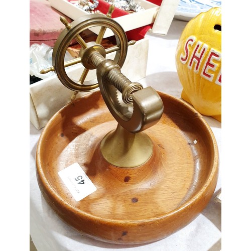 45 - A vintage nut bowl and cracker in the form of a ship's wheel, diameter 7